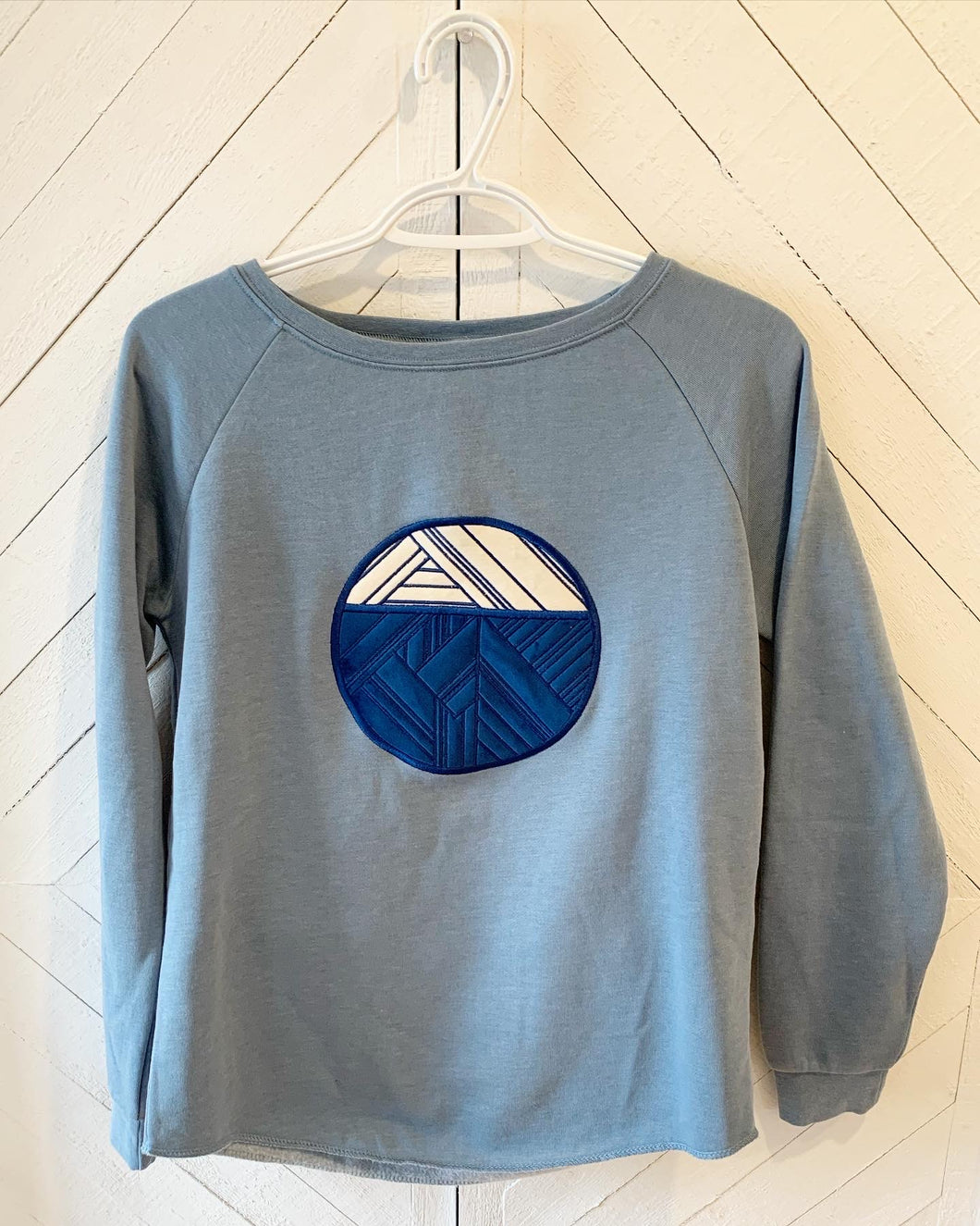 Spring sweater - Blue Trimscape Logo