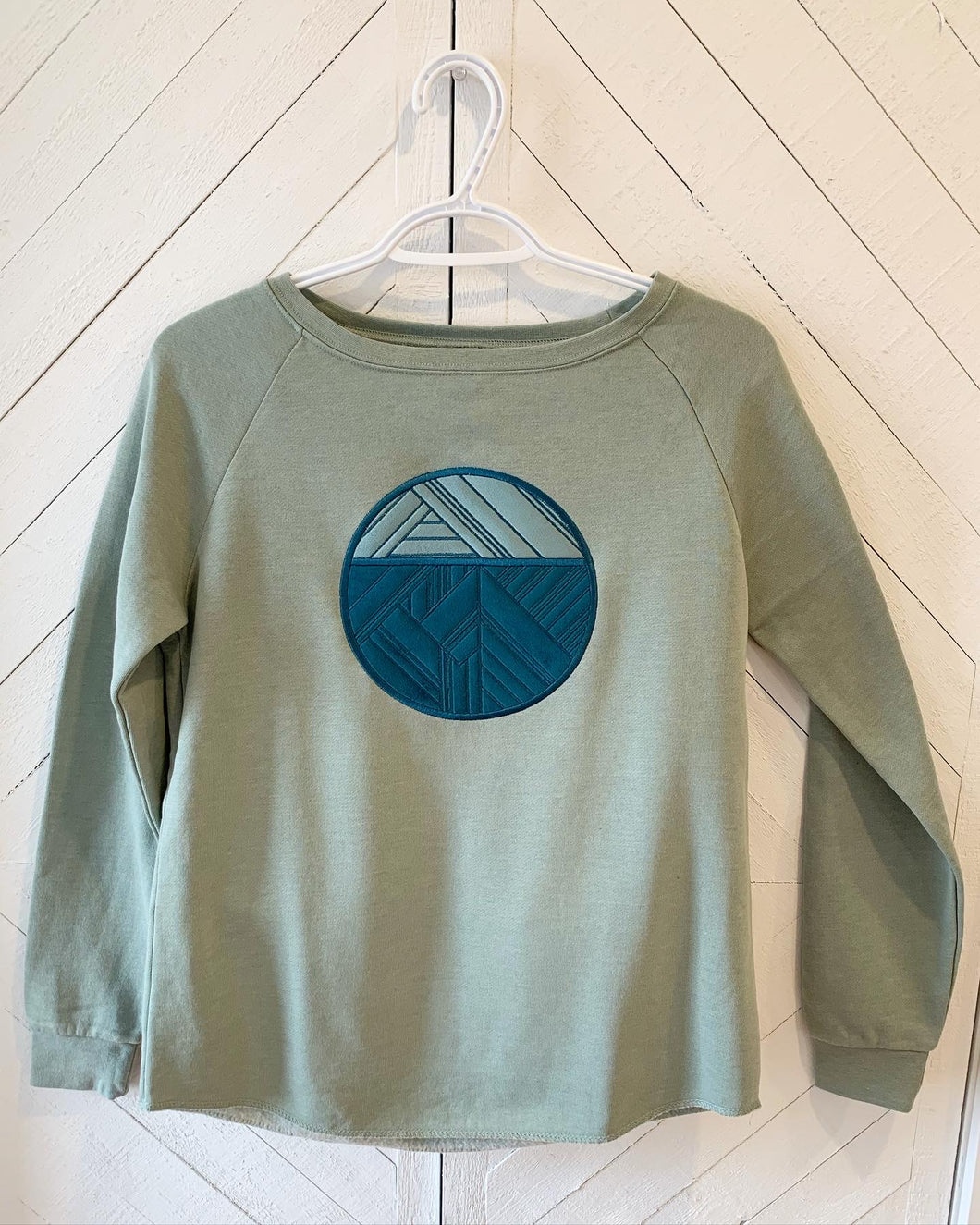 Spring sweater - Green Trimscape Logo