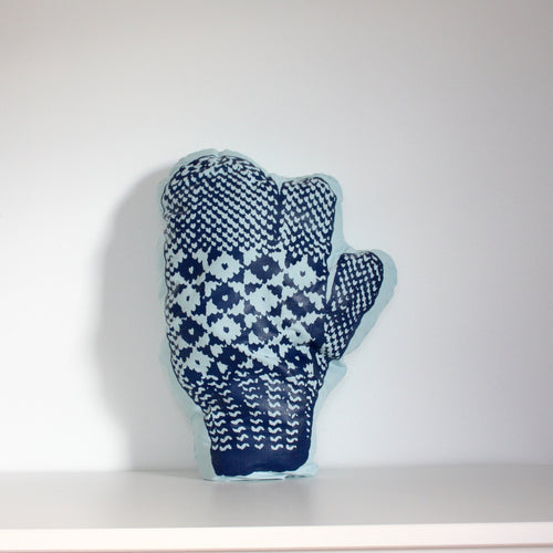 Aqua trigger mitten pillow with dark blue print.